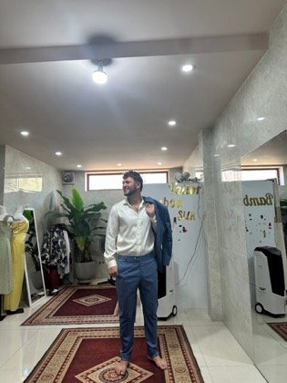 Clothes made at Bambou Silk Tailor Hoi An (Tea's), photo by a customer (Tivon Ingalsbee)