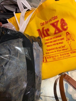Clothes made at Mr. XE, photo by a customer (Maya Ngo)