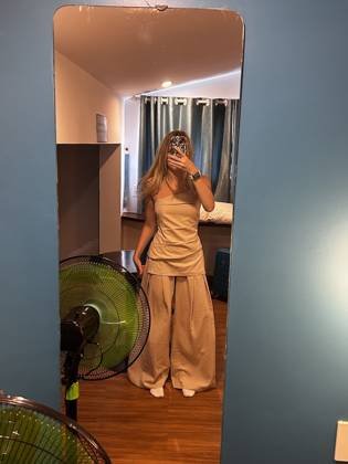 Clothes made at “Ms. An” No. 90 Tailor Inside Hoi An Cloth Market, photo by a customer (Niamh Underwood)