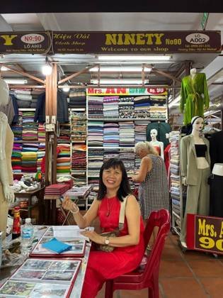 Clothes made at “Ms. An” No. 90 Tailor Inside Hoi An Cloth Market, photo by a customer (Camila San Martín)