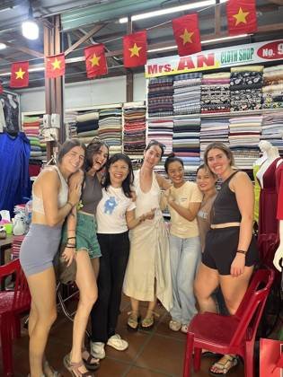 Clothes made at “Ms. An” No. 90 Tailor Inside Hoi An Cloth Market, photo by a customer (Leire Leonet)