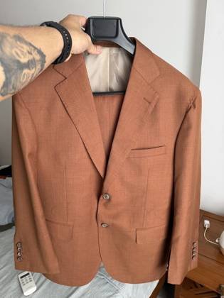 Clothes made at Tiệm may LeeTran Tailor, photo by a customer (John Aguilar)